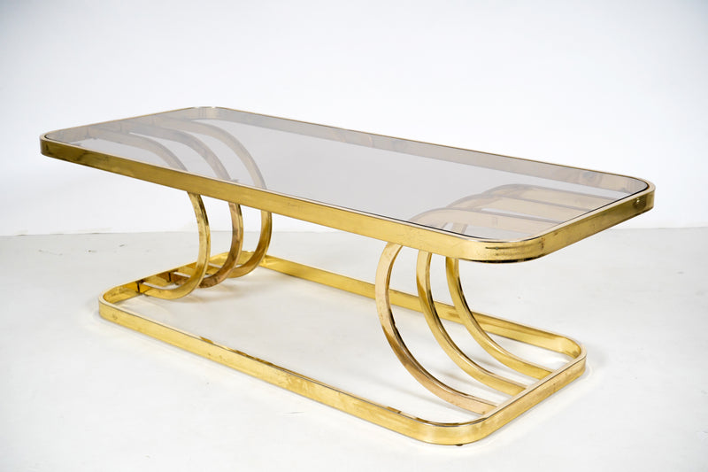 A Vintage Chrome Coffee Table With Glass Top