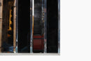 An Art Deco Style Mirror With Chrome Frame