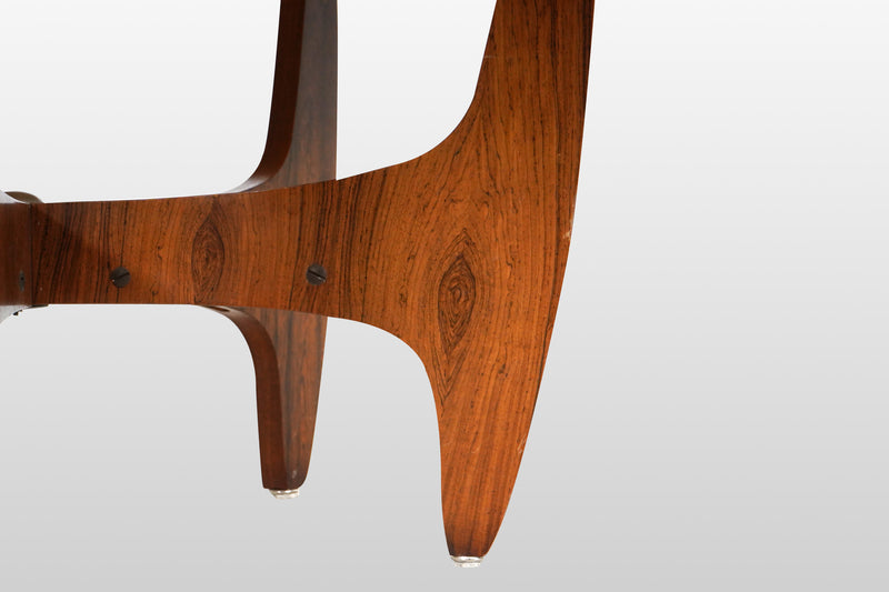 A Round Coffee Table with Embossed Top