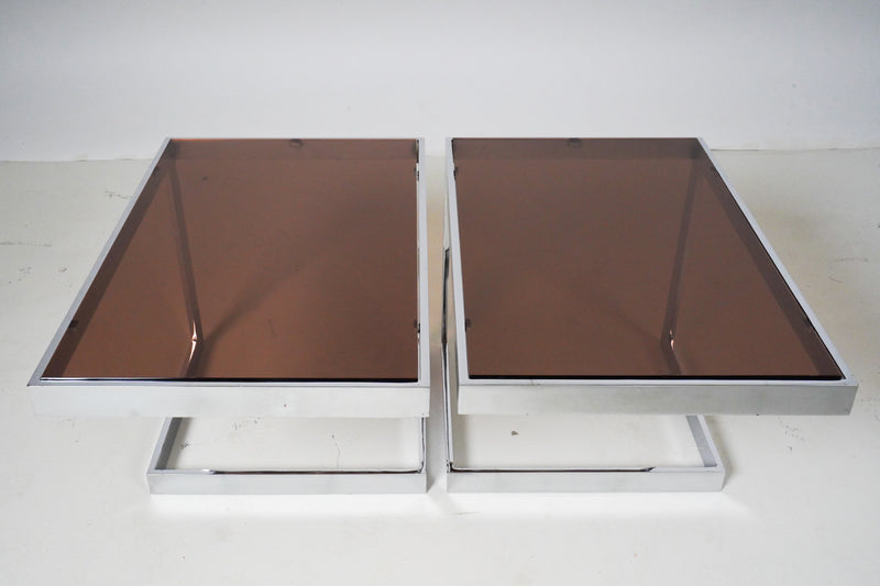 A Pair of Side Tables With Chrome Frames and Smoked Glass Tops 
