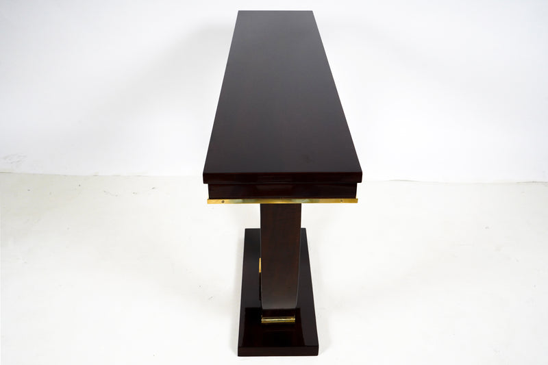 A Walnut Veneer Console with Brass Trim