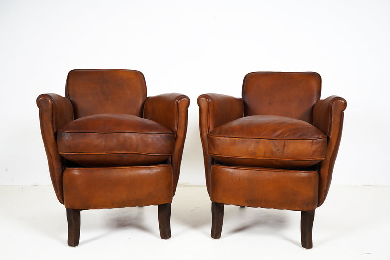 A Pair of Submarine Leather Chairs