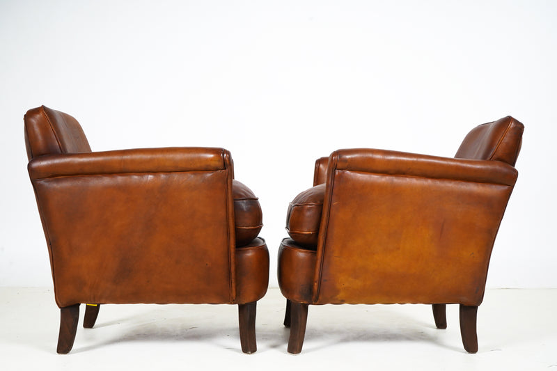 A Pair of Submarine Leather Chairs